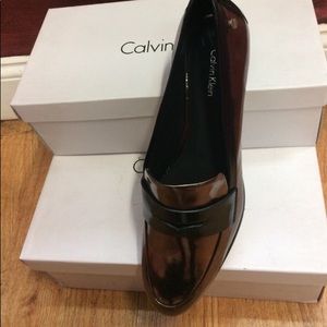 Calvin Klein’s metallic shoes